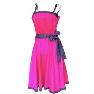 Italian stretch cotton fit and flare dress. Fushia with black straps, trim belt.